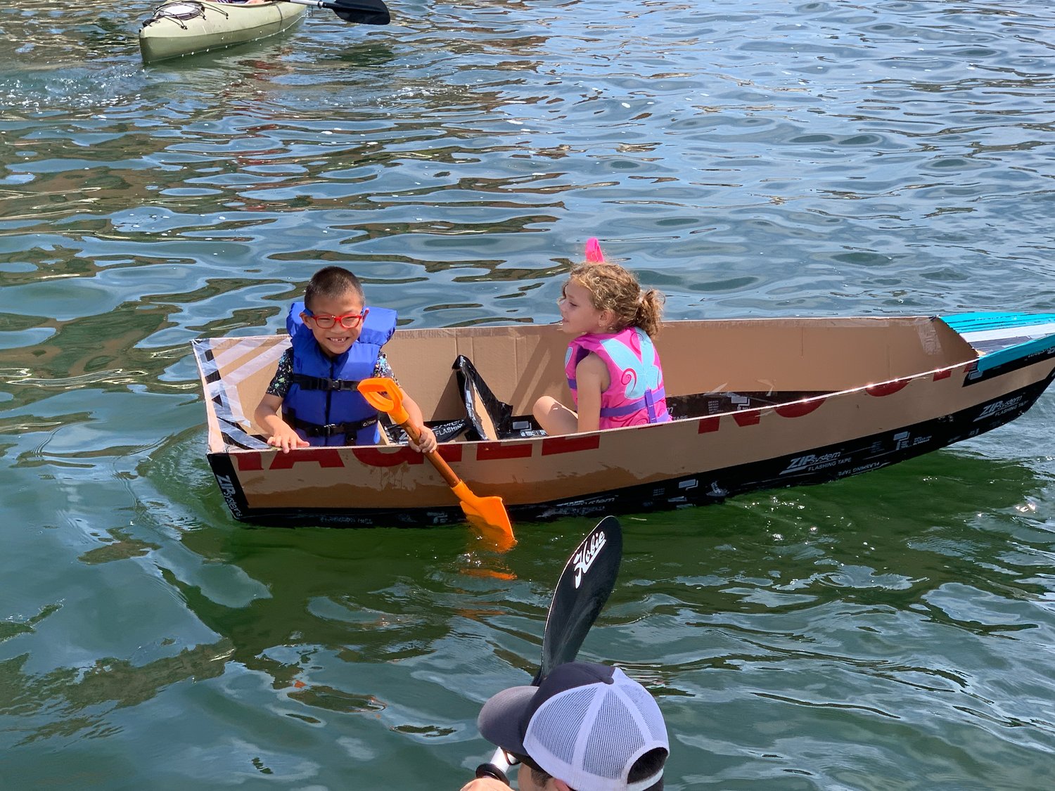 First cardboard boat float at new Bristol Town Marina is a hit